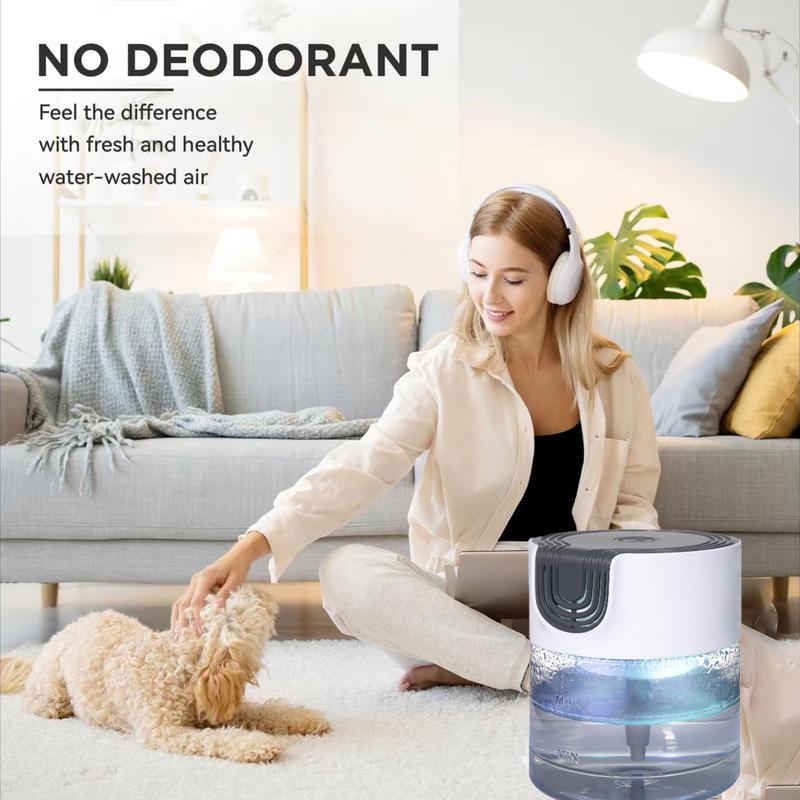 A woman pets her dog in a cozy living room next to a Zainzio water-based air purifier. Text: NO DEODORANT. Feel the difference with fresh and healthy water-washed air.