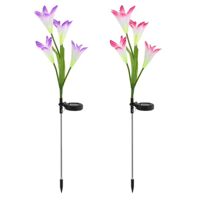 Two solar-powered floral lights with pink and purple flowers on white background