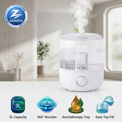 A white Zainzio humidifier emits mist, showcasing its 3L Capacity, 360° Nozzles, Aromatherapy Tray, and Easy Top-Fill features.