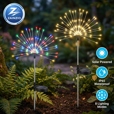 Two solar-powered garden lights with colorful and white lights, Zainzio logo visible, on a natural background.