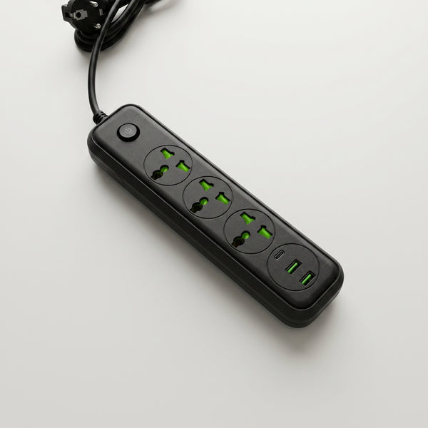 A black Zainzio 6-in-1 power strip with an attached cord, featuring three illuminated universal outlets, two USB-A ports, and one USB-C port on a clean white surface.