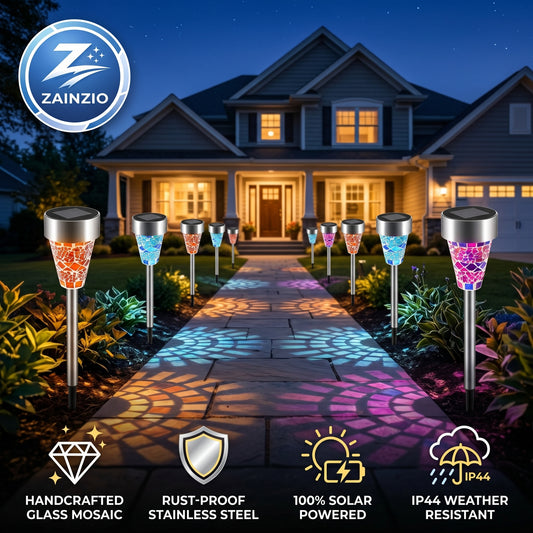 Zainzio solar pathway lights illuminating a house at night with colorful mosaics projected on the ground.