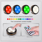 A product image showing four puck lights illuminated in red, blue, green, and white. There are 16 colors to choose from, with two convenient control modes: Manual control and Remote control.