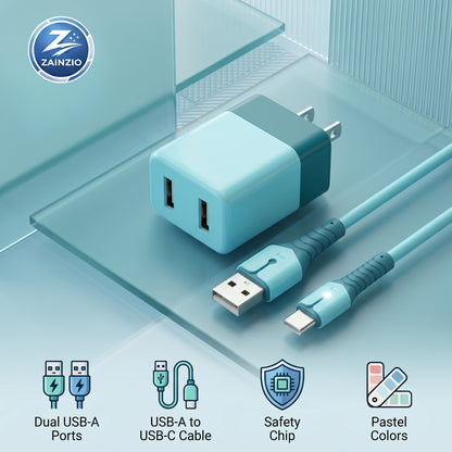 Teal USB charger with cable on a light blue background, featuring Zainzio branding.
