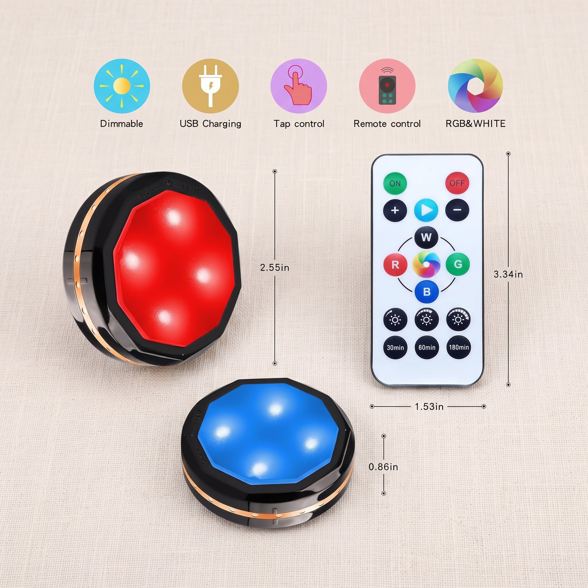 Two Zainzio wireless RGB puck lights, one red and one blue, are shown with their remote control and feature icons. Features: Dimmable, USB Charging, Tap control, Remote control, RGB&WHITE. Dimensions: 2.55in, 3.34in, 1.53in, 0.86in. Remote buttons: ON, OFF, W, R, G, B, 30min, 60min, 180min.