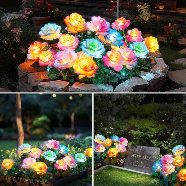 Colorful LED flower lights on a stone base in a garden setting.