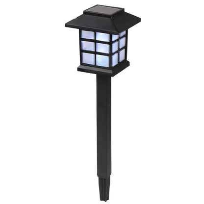 Solar-powered outdoor lamp with a black base and glass cover on a white background
