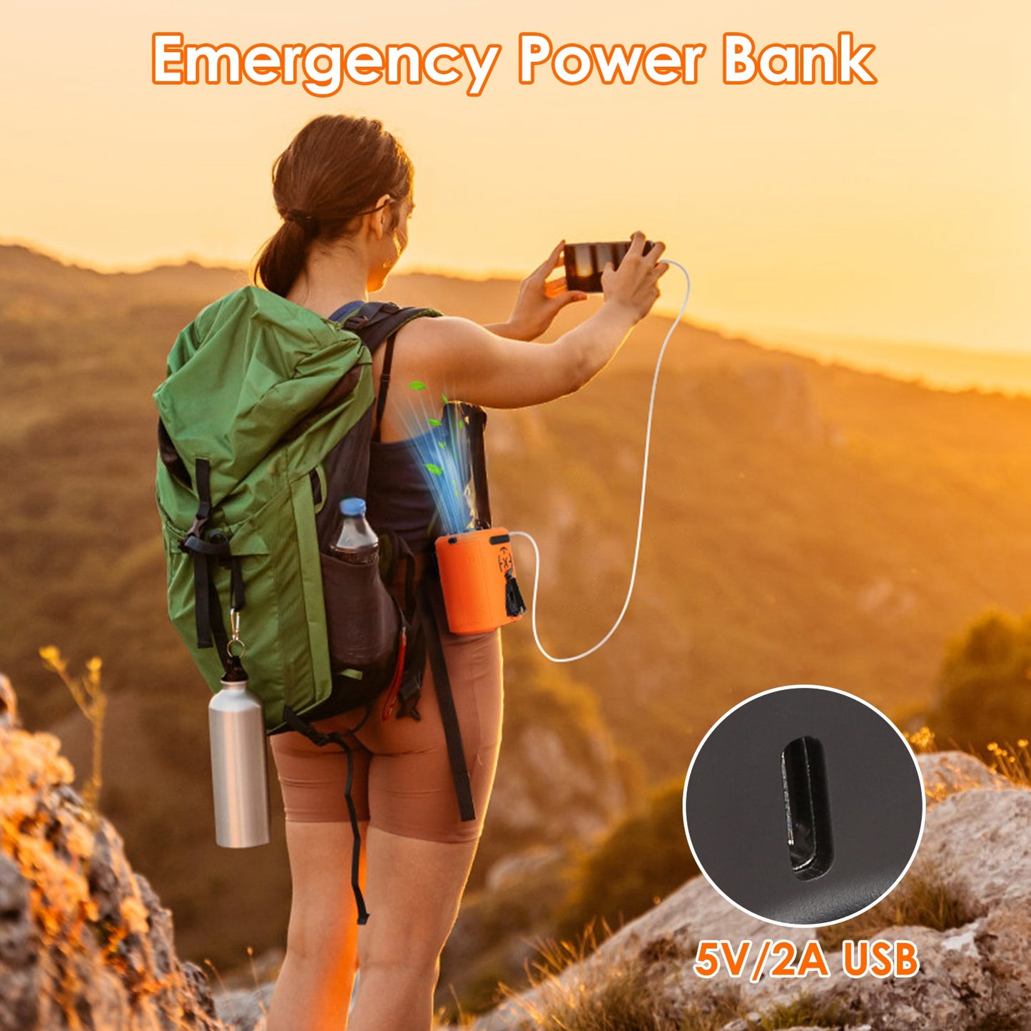 Person with green backpack using an emergency power bank on a mountain at sunset