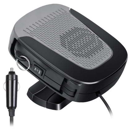A black and grey portable car heater and defroster with a 12V cigarette lighter plug. It has a switch labeled "Fan O Heat" for mode selection.