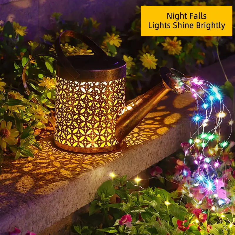 Decorative lantern with string lights on a stone ledge surrounded by flowers