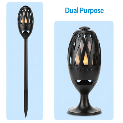 A black LED flame wireless speaker torch is displayed in two configurations: a garden stake and a tabletop lamp. The image highlights its versatility with the text "Dual Purpose.