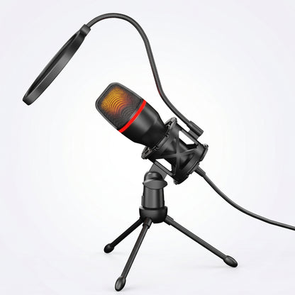 A black USB condenser microphone with glowing orange RGB lights and a red band, mounted on a desktop tripod stand with a flexible pop filter.