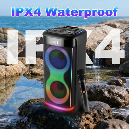 A black party speaker with colorful RGB lights and a microphone rests on rocks by the water. The image features the text "IPX4 Waterproof" and "IPX4".