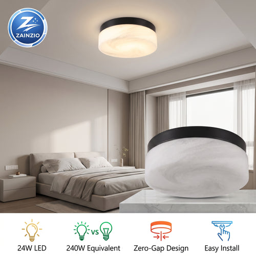 A modern semi-flush ceiling light fixture with a white marble-look round glass shade and a black metal rim, shown installed on a bedroom ceiling with a large foreground cutout of the same light. The image includes a ZAINZIO brand logo and feature icons at the bottom.