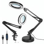 Black adjustable ring magnifier lamp with two viewing angles, a USB charging cable, and a clamp stand on a white background.