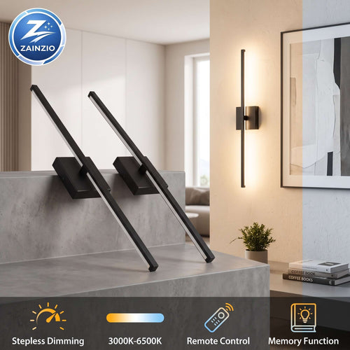 Two 28-inch matte black linear LED wall sconces shown in a modern interior.