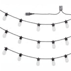 Three strands of outdoor string lights with clear frosted globe bulbs on black cords, with a power adapter and connector box shown on a white background.