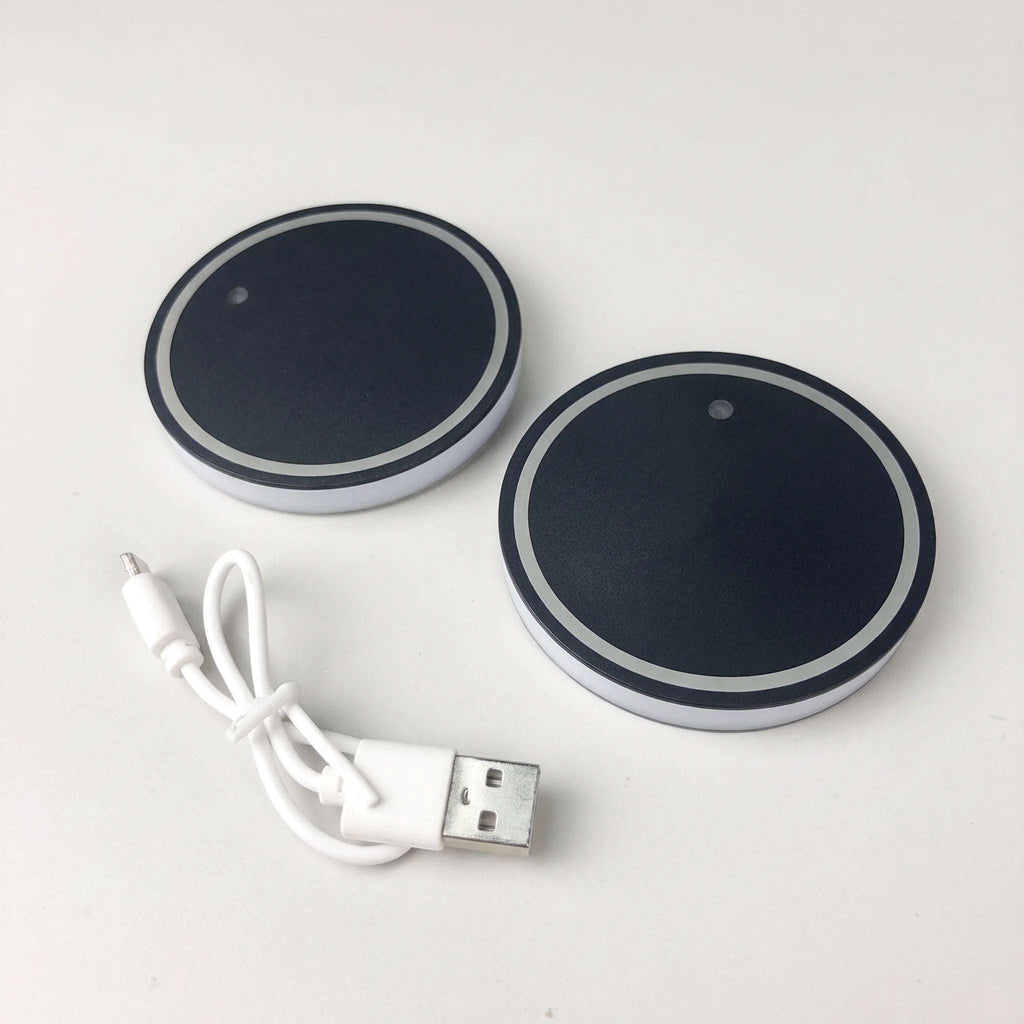 Two Zainzio 2.7-inch 7-color LED car cup holder coasters with a USB charging cable on a white background.
