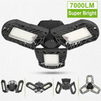 A black three-arm LED floodlight shown on a light textured background, with a green '7000LM Super Bright' label in the top right and four smaller alternate views along the bottom.