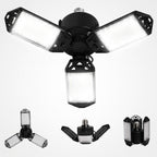 Black LED flood light with adjustable arms on a white background
