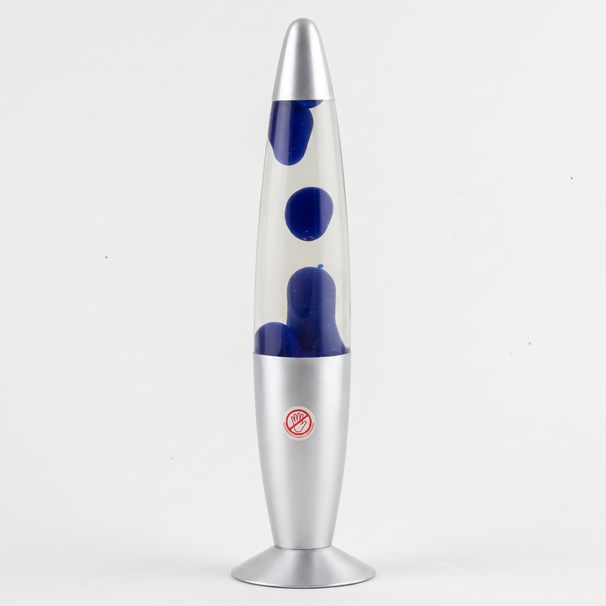 A classic lava lamp with a silver metal base and top, filled with clear liquid and dark blue wax blobs, shown against a plain white background.