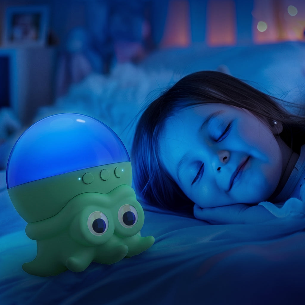 A child sleeping peacefully in bed under a blue nightlight that features a green octopus character with a glowing blue dome on top.