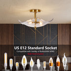 A modern semi-flush mount ceiling light fixture with a gold-toned metal frame and a translucent white wave-shaped glass shade, shown installed on a textured ceiling in a room setting. Below the fixture, text reads 'US E12 Standard Socket Compatible with Variety of Bulbs(MAX 60W)' and 'Bulb Not Included'.