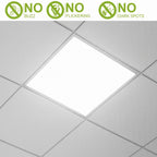 A square white LED ceiling light panel installed in a white tiled ceiling, with three green and white feature badges at the top reading 'NO BUZZ', 'NO FLICKERING', and 'NO DARK SPOTS'.