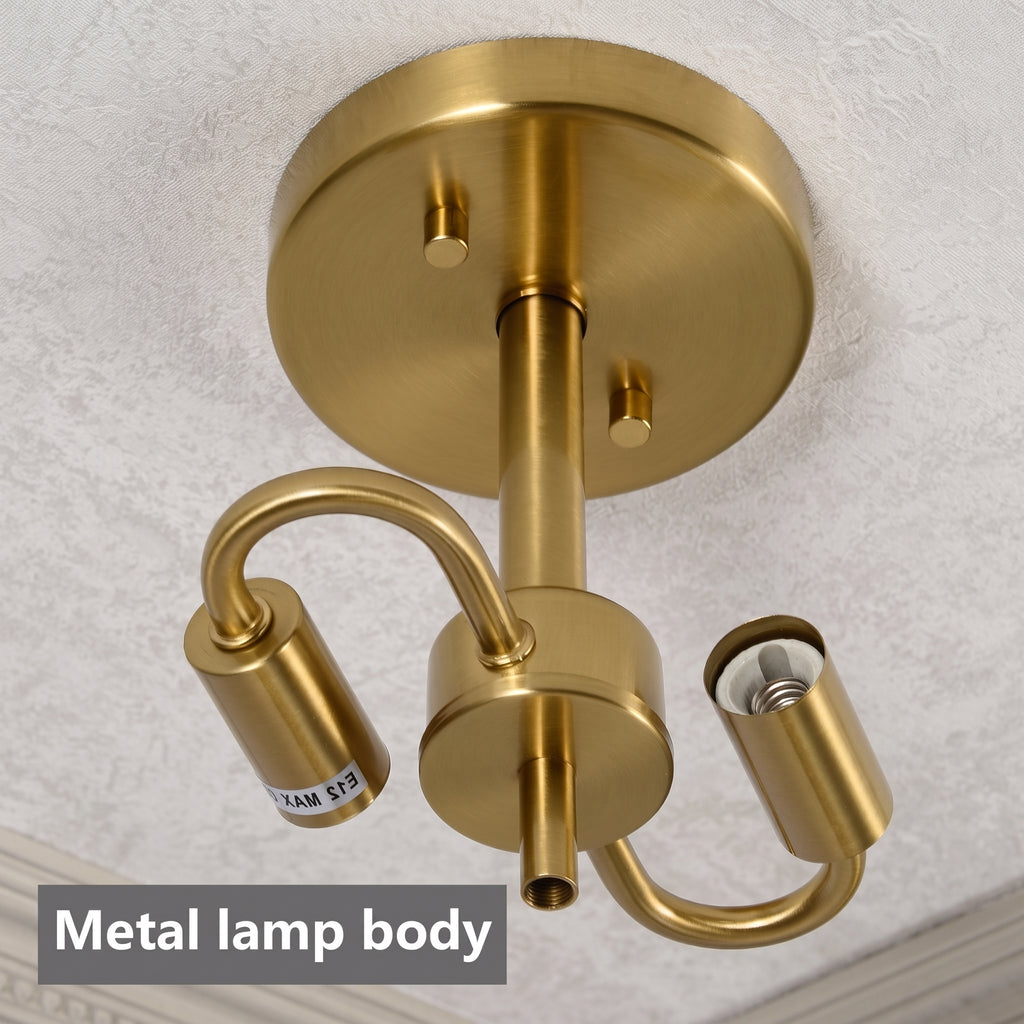 A three-light brass ceiling mount fixture with curved arms and cylindrical shades, shown installed on a textured white ceiling. A text overlay at the bottom left reads 'Metal lamp body'.