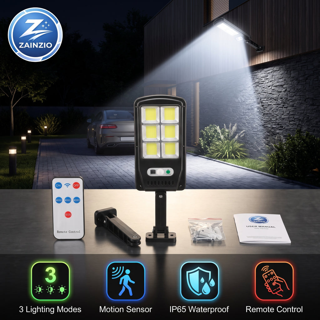 A ZAINZIO solar pathway light with a remote control, mounting bracket, and manual, displayed on a table with a background showing the light illuminated at night on a driveway.