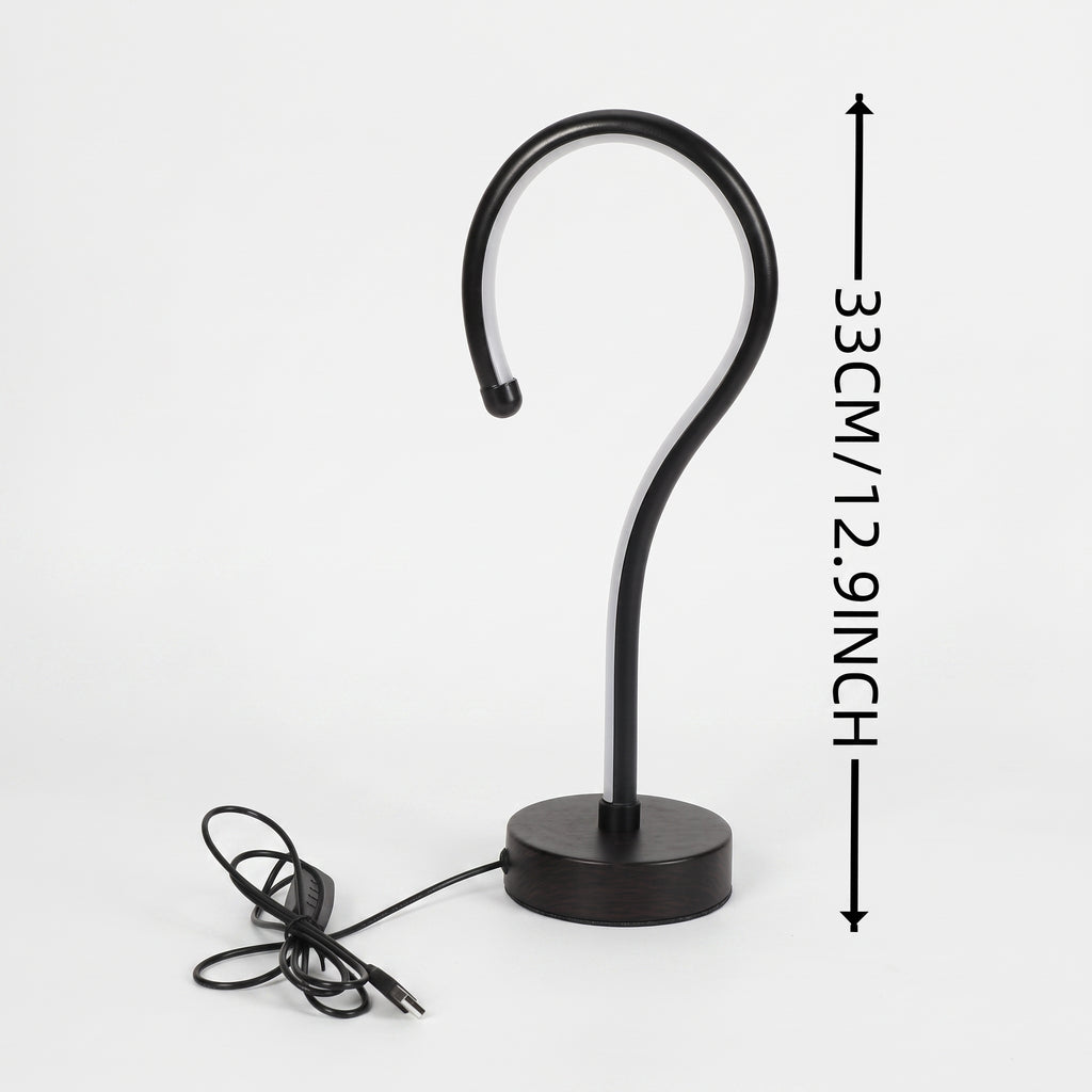 Black metal S-shaped hook lamp with a round base and power cord, shown on a light gray background with a vertical height measurement annotation of 33CM (1.29 inches).