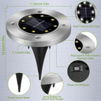 Solar garden stake light with dimension annotations and feature callouts on a brushed metal background. The product has a round brushed silver top with a black solar panel and LED chip face, and a black ground stake.