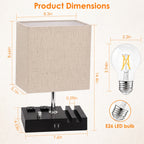 Product dimensions diagram of a modern table lamp with a beige linen-textured square shade, a black multi-port USB base, and a clear E26 LED bulb shown with dimension callouts on a light beige background.
